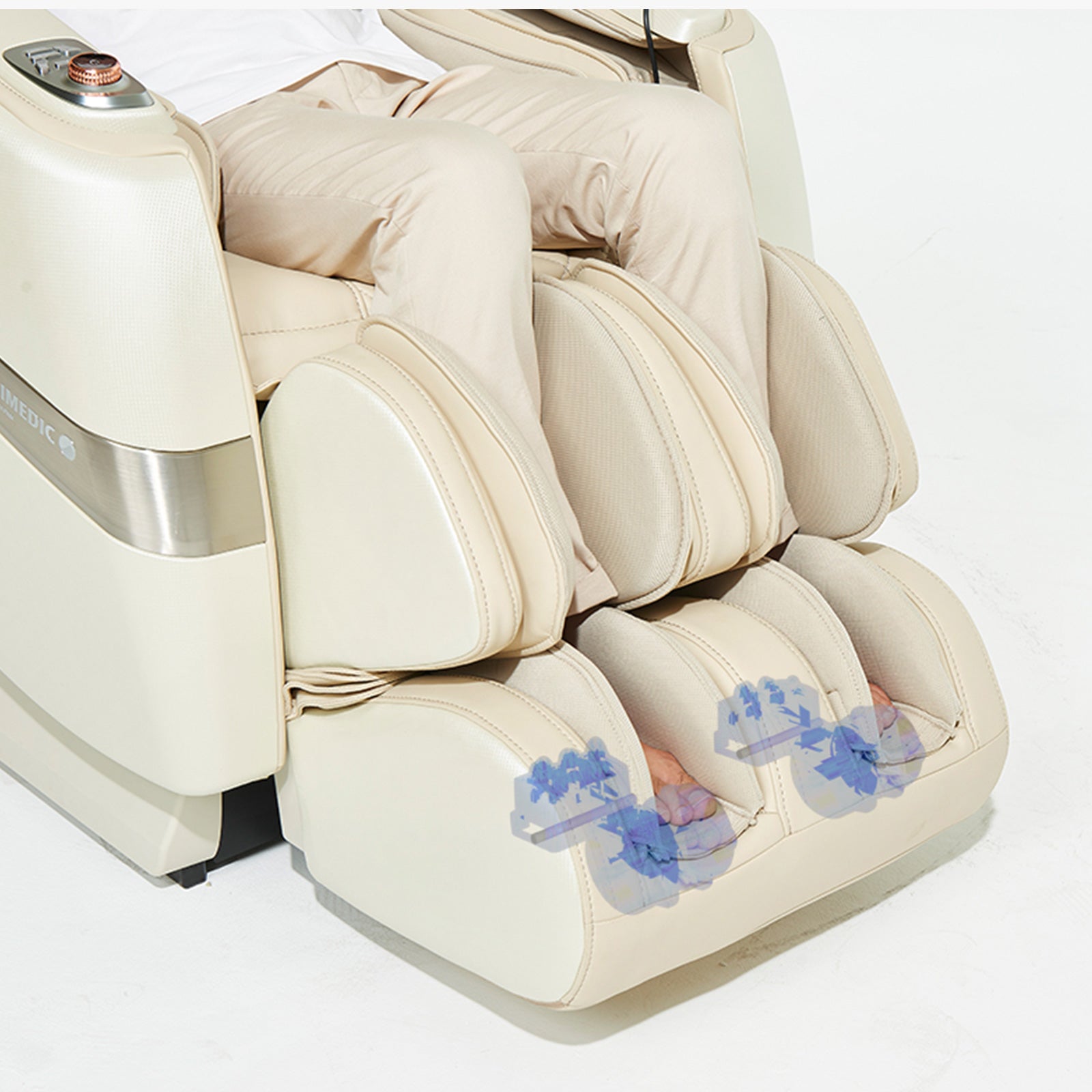 Person relaxing in a JPMedics Kumo Massage Chair with visible 4D massage rollers.