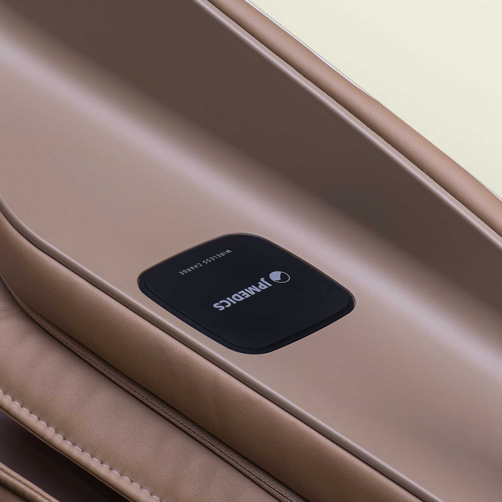 Close-up of a JPMedics remote on a beige leather JPMedics KaZe Massage Chair.