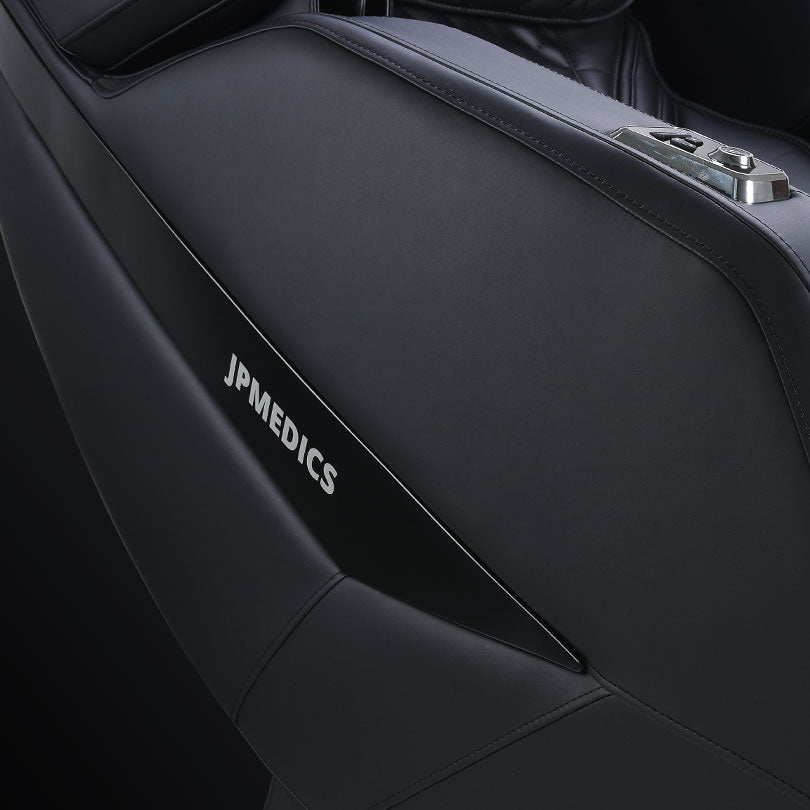 Close-up of a black JPMedics Kawa Massage Chair showing the control panel and branding.
