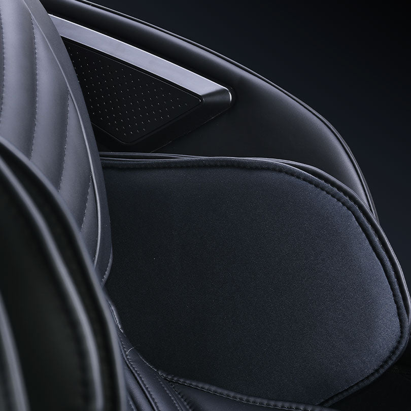 Close-up of JPMedics Kawa Massage Chair in black with quilted and smooth upholstery details.